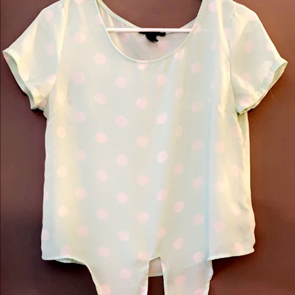 Teal shirt with polkadots